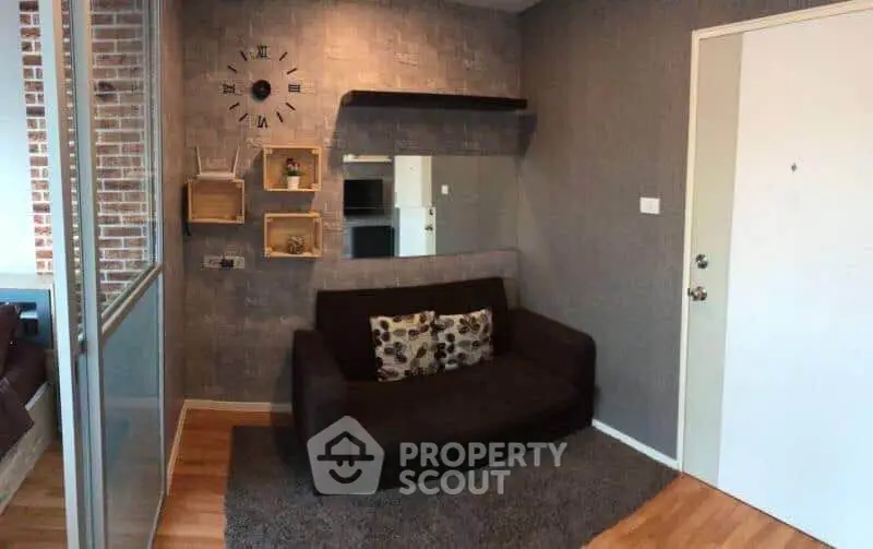 Cozy living room with modern decor and stylish wall clock
