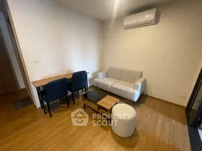 Cozy living room with modern furniture and air conditioning