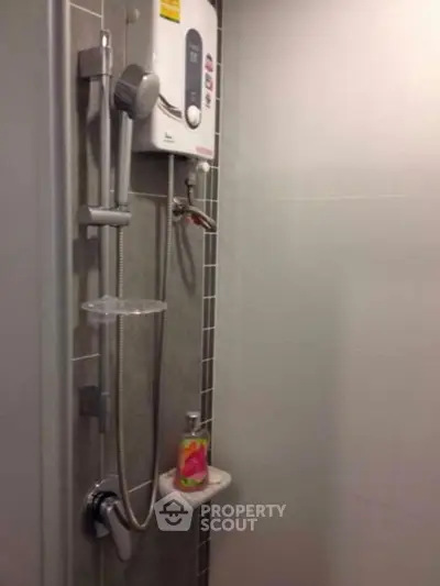 Modern bathroom shower with water heater and sleek design