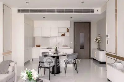 Elegant modern living room with open kitchen and stylish decor