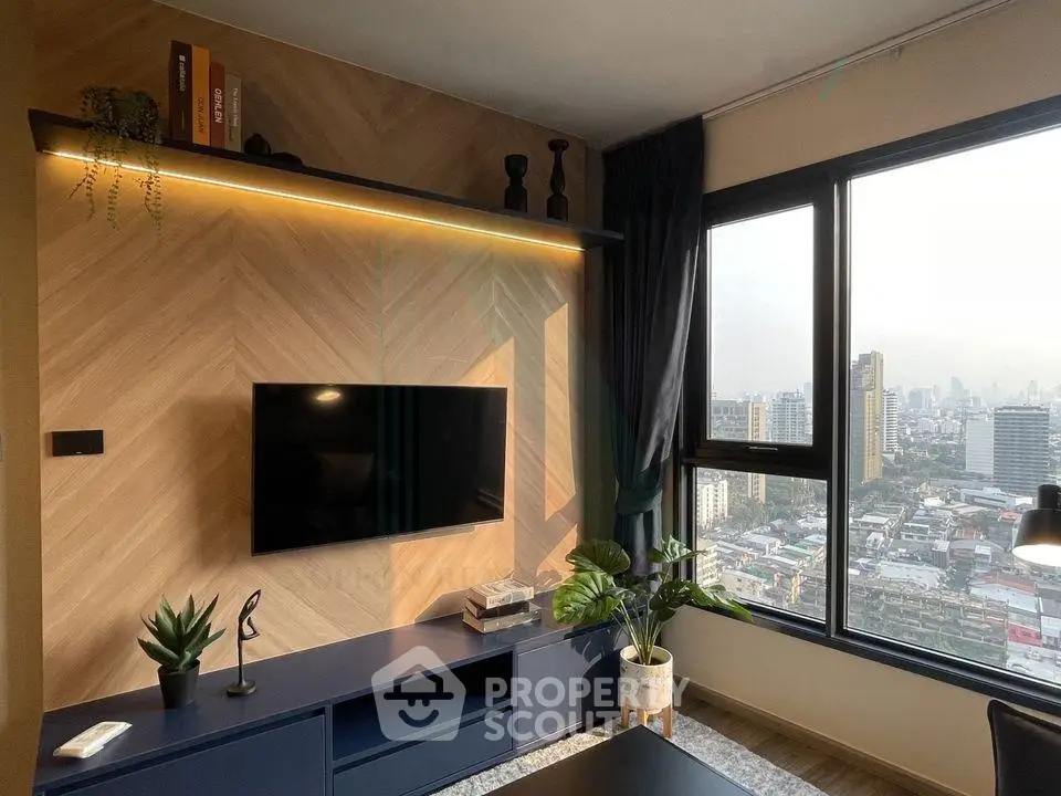 Modern living room with city view, stylish decor, and large window for natural light.