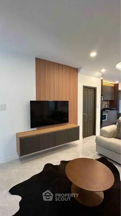 Modern living room with sleek TV setup and stylish decor