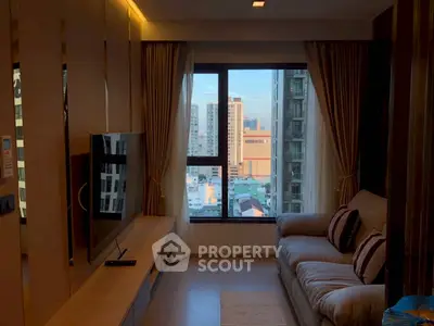 Modern living room with city view, featuring a cozy sofa and wall-mounted TV.