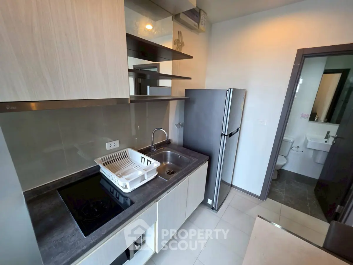 Modern kitchen with sleek cabinetry and stainless steel appliances
