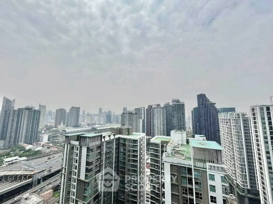 Stunning cityscape view from a high-rise building showcasing modern urban living.