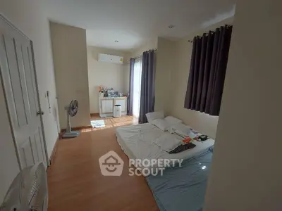 Cozy bedroom with minimalist decor and natural light