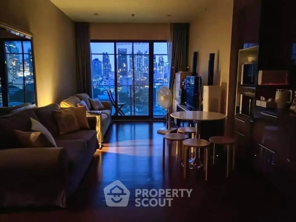 Chic urban living room with stunning city skyline view, modern furniture, and ambient lighting.
