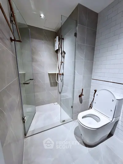 Modern bathroom with sleek shower and elegant tile design