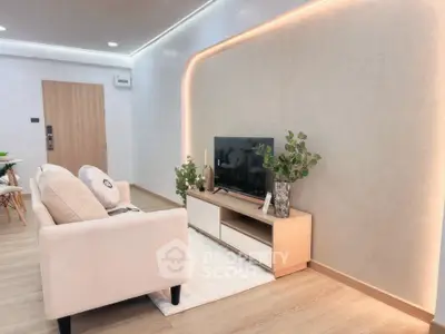 Modern living room with stylish lighting and cozy seating area