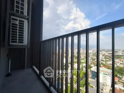 Stunning city view from high-rise balcony with modern railing