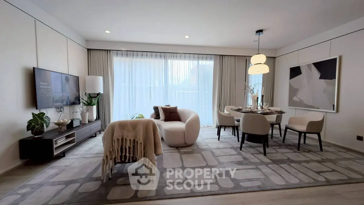 Stylish modern living room with elegant dining area and cozy seating