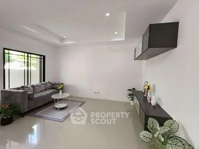 Spacious modern living room with elegant decor and natural light