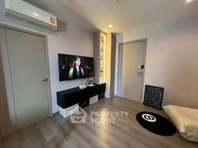 Modern living room with sleek TV setup and stylish decor