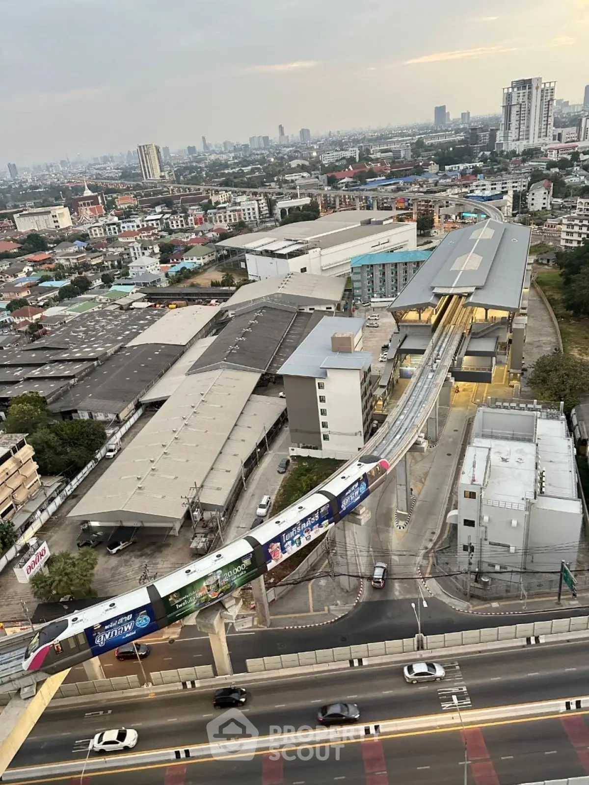 Stunning aerial view of urban landscape with modern transit system and city skyline