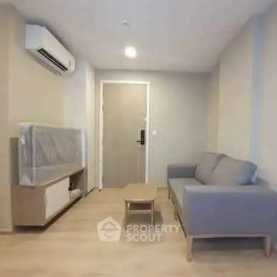 Modern living room with air conditioning and minimalist furniture