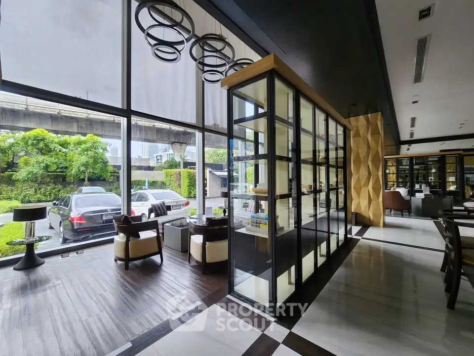 Luxurious modern lobby with floor-to-ceiling windows and stylish seating area