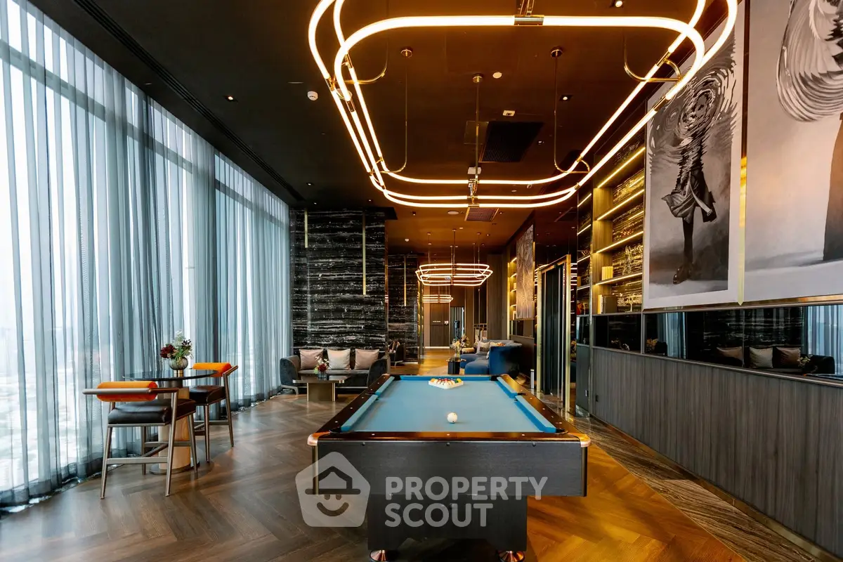 Luxurious modern living room with pool table and stylish lighting