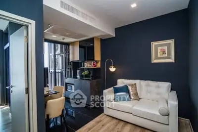 Modern living room with stylish decor and open kitchen layout