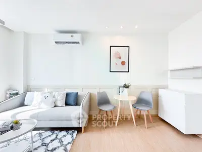 Modern living room with stylish decor and cozy seating area