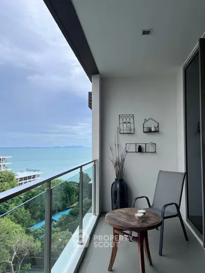 Stunning balcony with ocean view, perfect for relaxation and enjoying the serene surroundings.