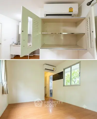 Spacious room with air conditioning and wooden flooring, featuring a built-in cabinet and large window.