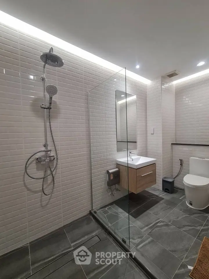 Modern bathroom with sleek shower and contemporary fixtures