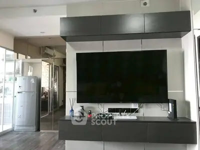Modern living room with sleek TV setup and stylish decor