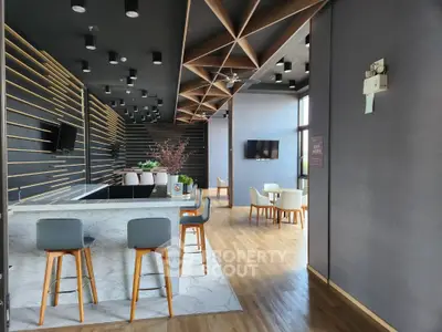Modern open-layout living space with stylish decor and natural light