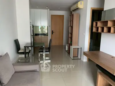 Modern apartment interior with sleek kitchen and stylish furniture, perfect for urban living.