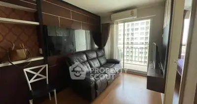 Modern living room with balcony view in high-rise apartment
