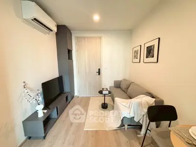 Cozy modern living room with stylish decor and air conditioning