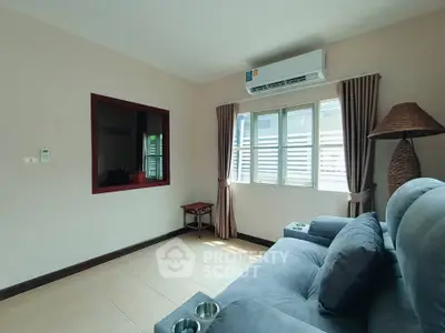 Cozy living room with modern air conditioning and natural light