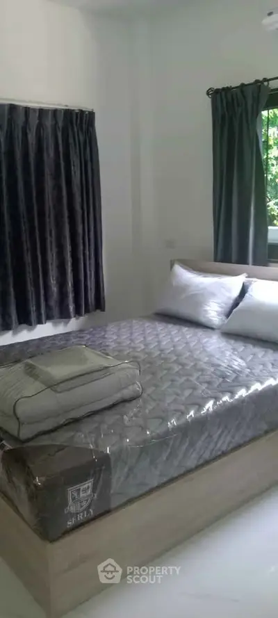 Cozy bedroom with modern decor and natural light