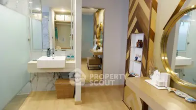 Modern bathroom with stylish decor and elegant fixtures in a contemporary home.