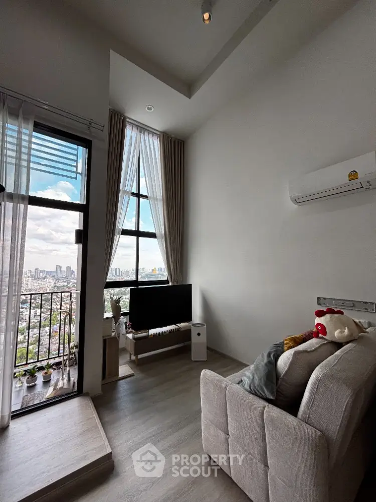 Modern living room with high ceiling and city view balcony in luxury apartment