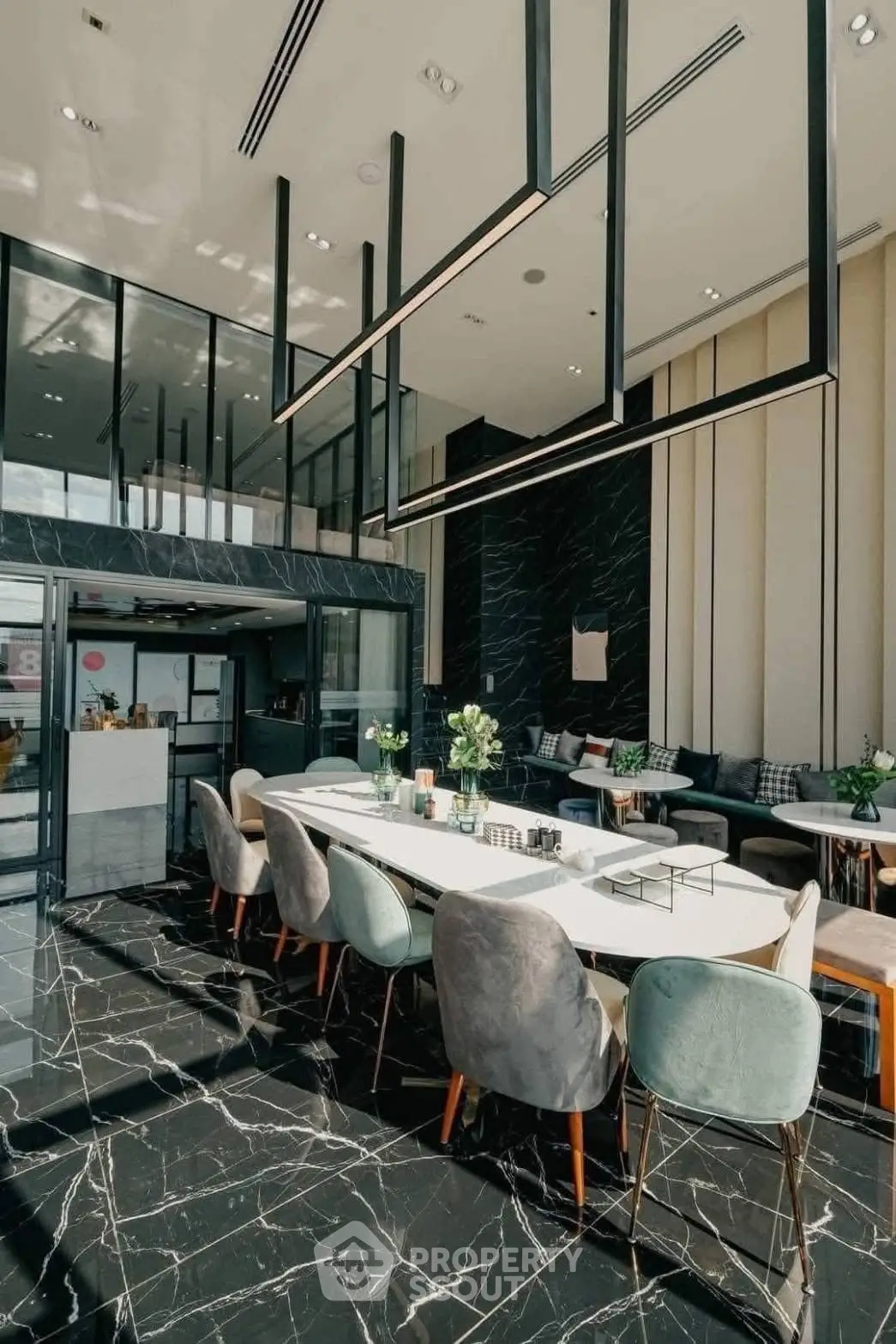 Luxurious modern living room with high ceilings and elegant marble flooring