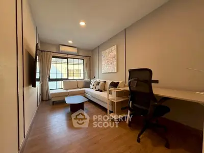 Modern living room with stylish furniture and natural light