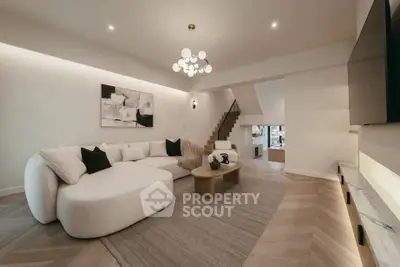 Spacious modern living room with elegant decor and stylish lighting