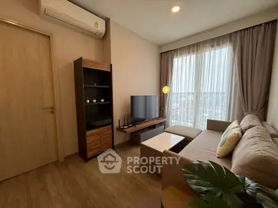 Modern living room with cozy sofa and large window view