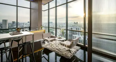 Luxurious high-rise apartment with stunning city view and modern interior design.