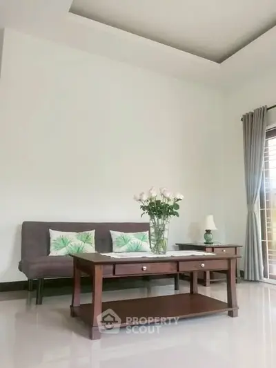 Elegant living room with modern furniture and natural light