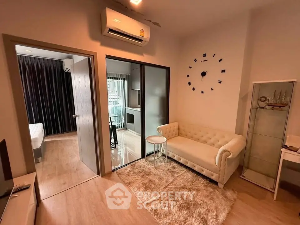 Modern living room with stylish decor and open layout in a cozy apartment.