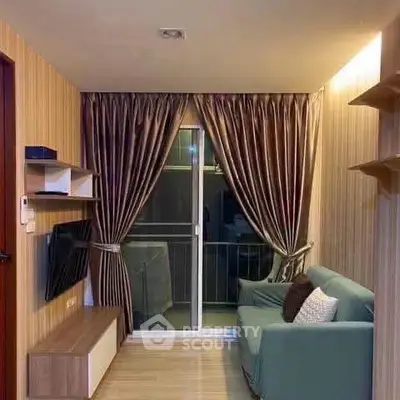 Cozy living room with elegant curtains and modern decor, featuring a comfortable sofa and wall-mounted TV.