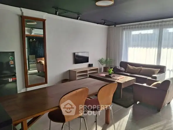 Stylish living room with modern furniture and natural light