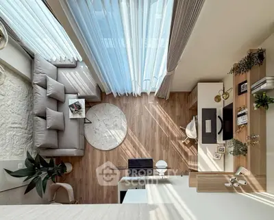 Modern living room with stylish decor and natural light