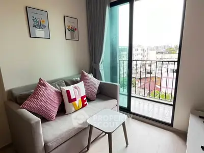 Cozy living room with balcony view in modern apartment