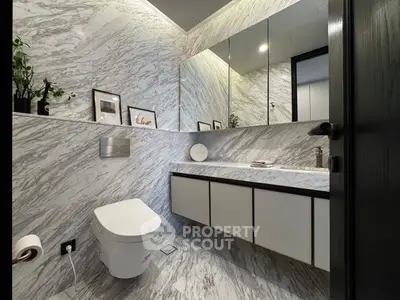 Luxurious marble bathroom with sleek fixtures and modern design
