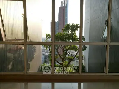 Stunning urban view from modern apartment balcony with glass windows