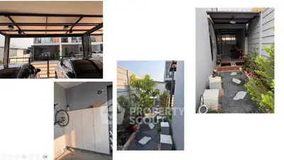 Modern townhouse with sleek garage, stylish garden path, and cozy outdoor seating area.