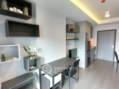 Modern apartment interior with sleek furniture and open kitchen layout
